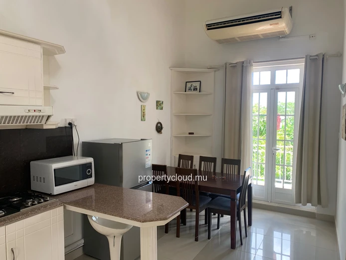 La Gaulette for sale villa divided into 4 two-bedroom apartments with commun swimming pool in a quiet residential area.