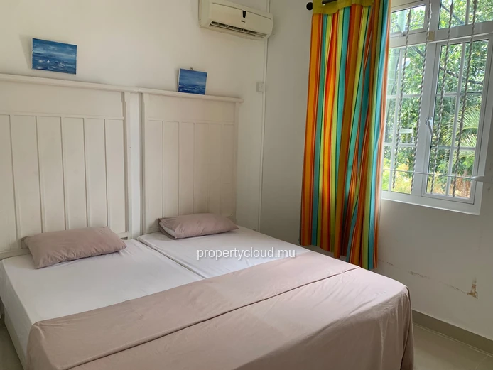 La Gaulette for sale villa divided into 4 two-bedroom apartments with commun swimming pool in a quiet residential area.