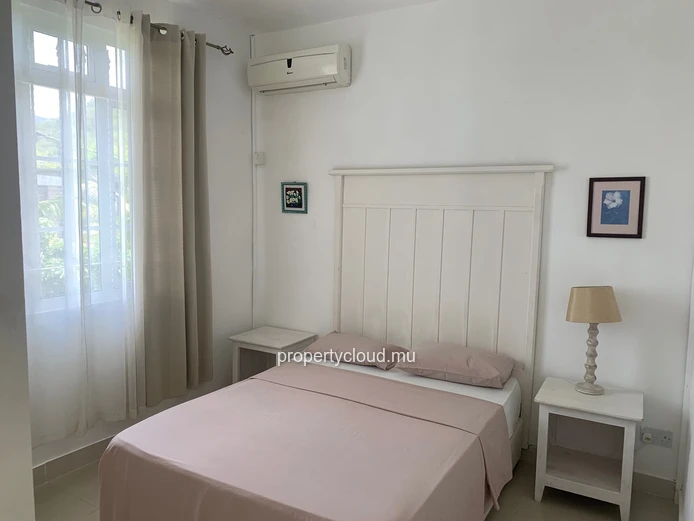 La Gaulette for sale villa divided into 4 two-bedroom apartments with commun swimming pool in a quiet residential area.